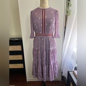 Gal Meets Glam Collection tiered midi dress with 3/4 sleeves.